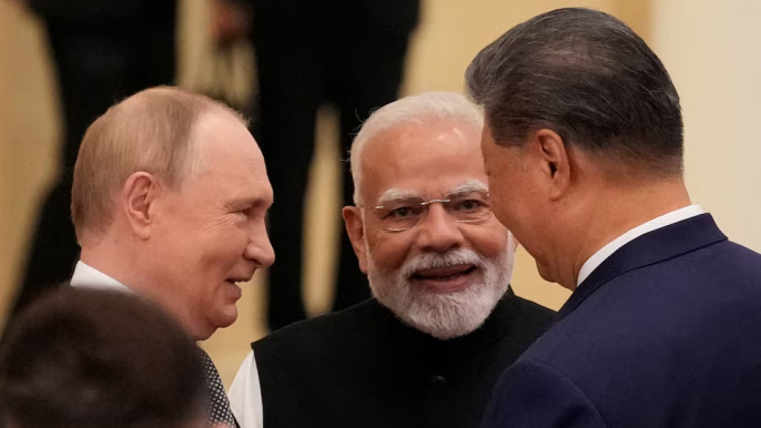 China’s Xi pushes a new global order, flanked by leaders of Russia and India  “Global governance has reached a new crossroads,” Xi said..