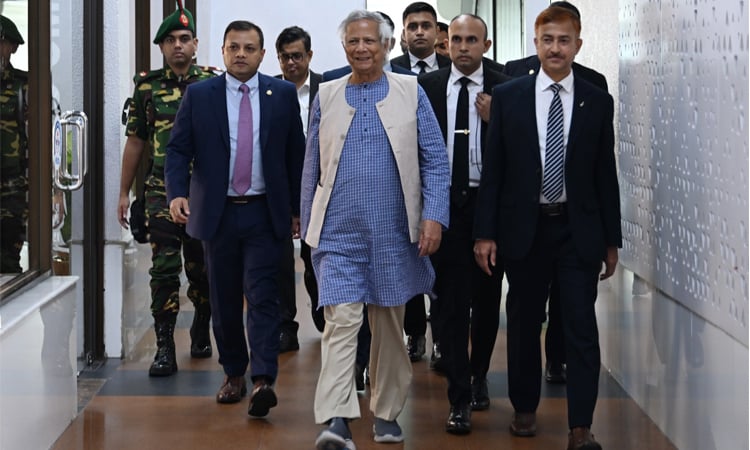 Prof Yunus returns home from Rome